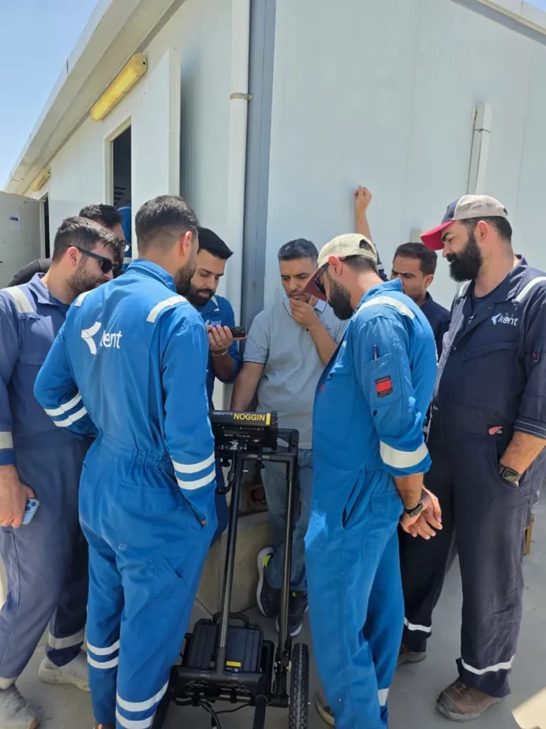 Course participants working through a live acquisition on the GPR cart