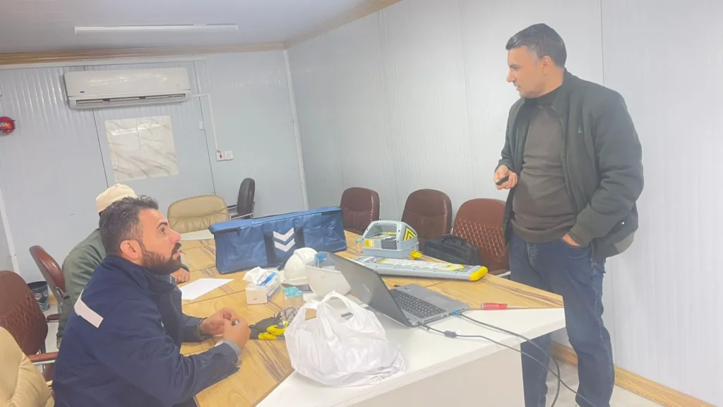 Classroom session on the gCAT4 at the client facility, with the locator and transmitter on the table