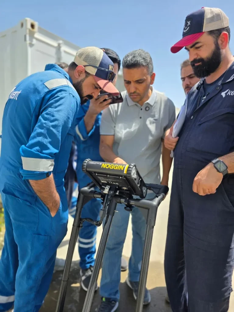 Oil company staff gathered around the Noggin control unit during GPR training