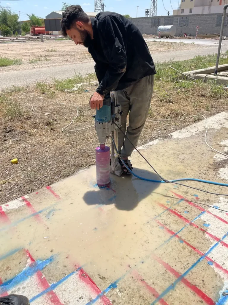 Cutting a core sample from a clear space between the marked reinforcement bars